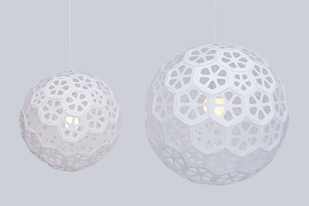 Flower Ball is a series of sphere geometric pendant lamp shades made with Japanese paper.