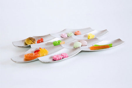 Sasa Tray is an organic shaped landscape inspired by the waves of the ocean; made from tin by traditional Japanese makers