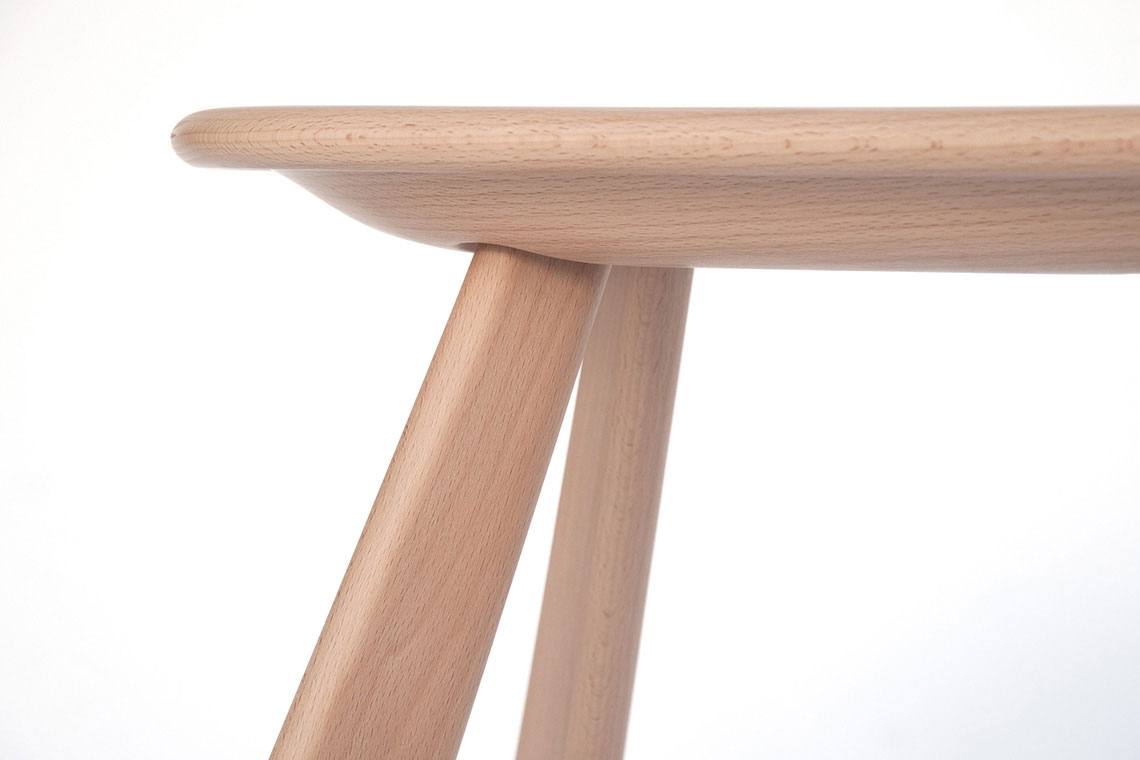 Atlas sculptural solid wood stool frontal detail of soft edge seat and legs designed and made by 24d-studio in japan