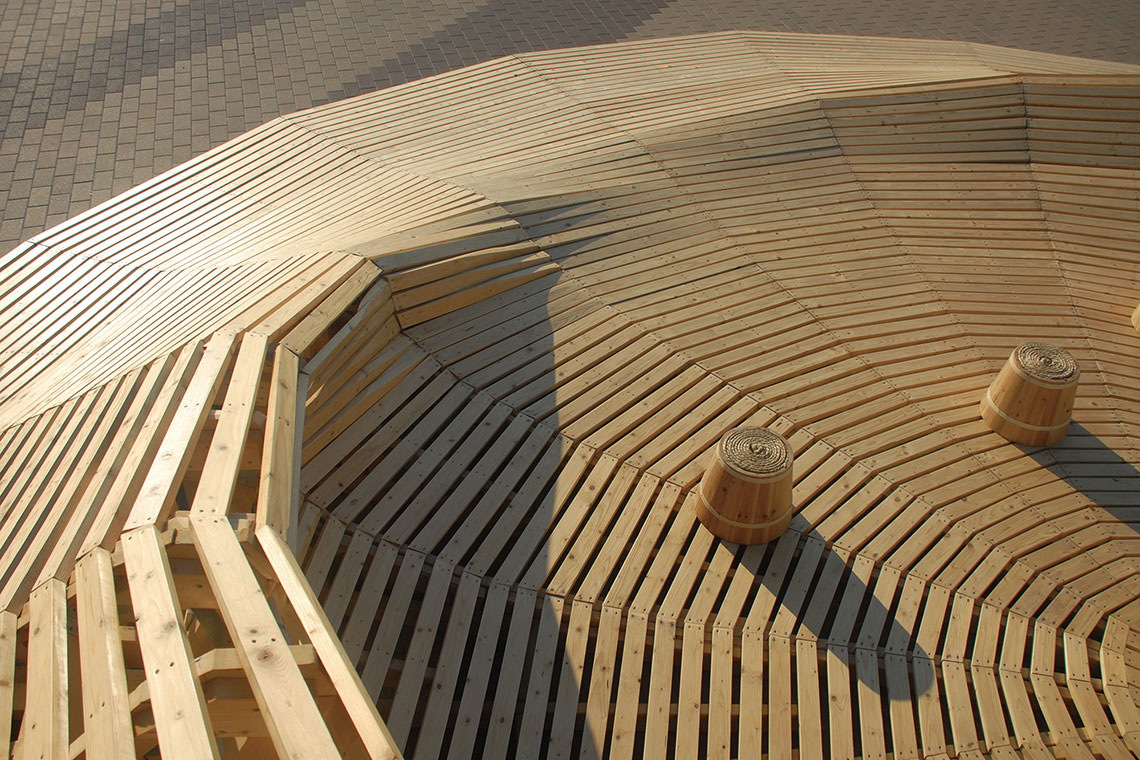 24d-studio designed Crater Lake wooden radial landscape detail of wood deck and small wood bucket seats.