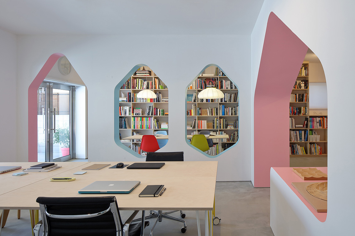 24d-studio main studio space with library space seen through hexagon windows