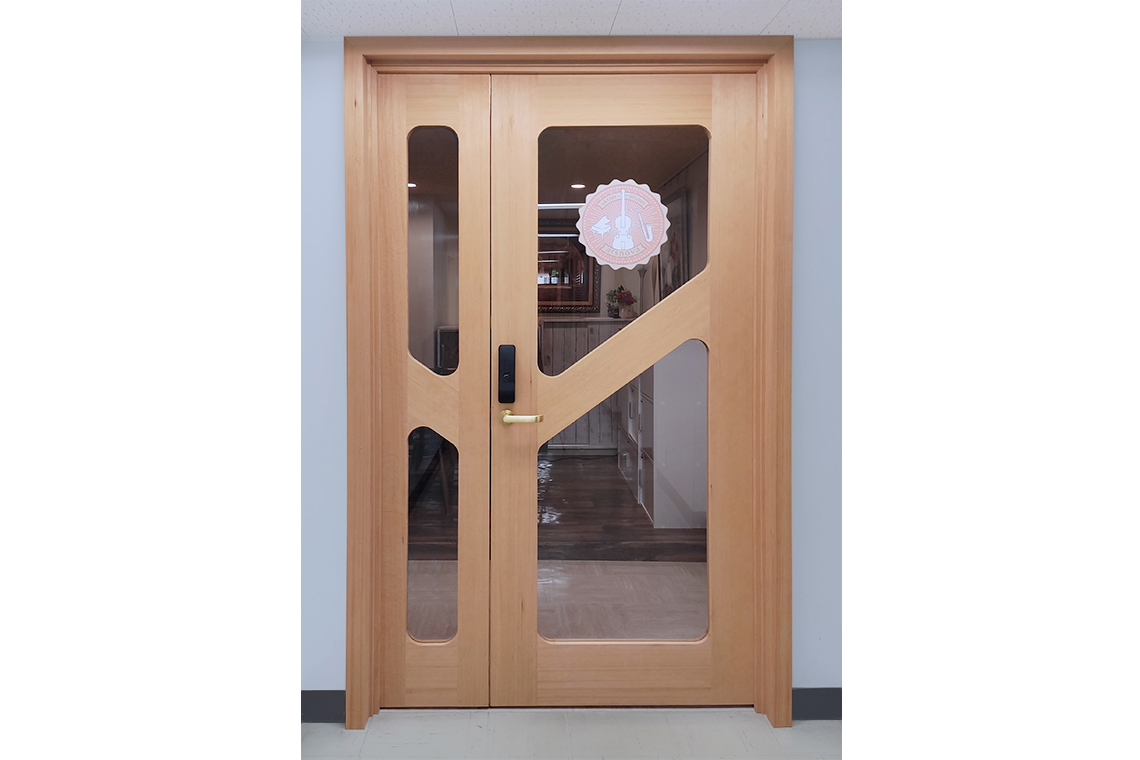 Music studio entrance is custom door designed by 24d-studio shows a door frontal view 