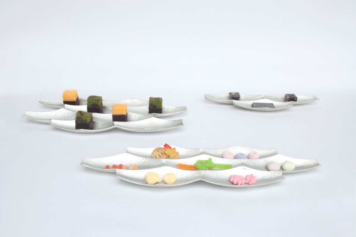 Sasa Trays are inspired by the flow and reflection of an ocean surface and are used for holding sweets, food and accessories