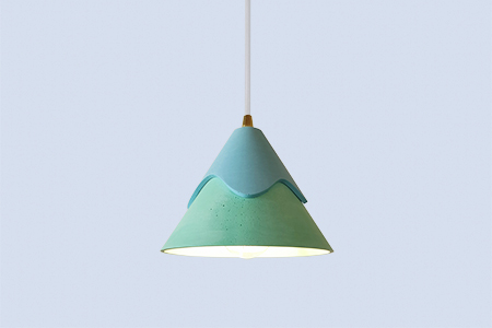 Rei is a collection of colorful pendant lights inspired by mountains and their surrounding nature.